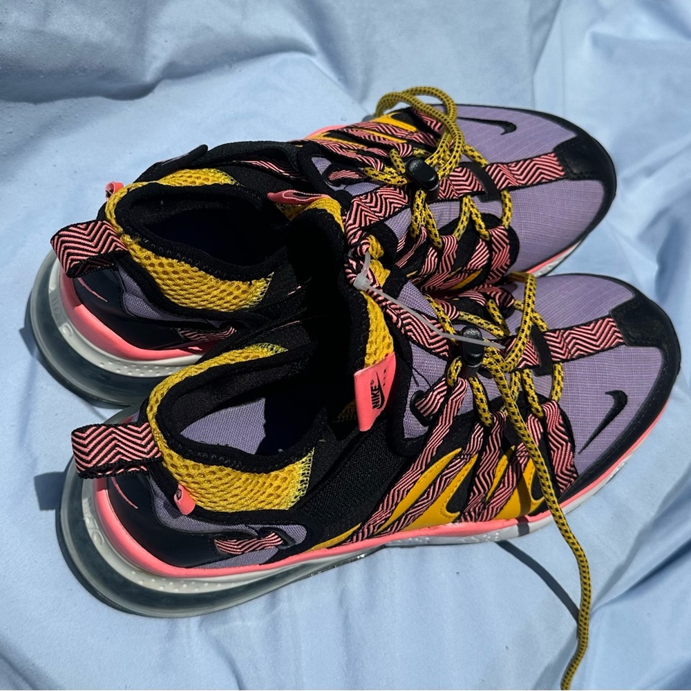 Nike Pink and Yellow Athletic Shoes with Bold Design